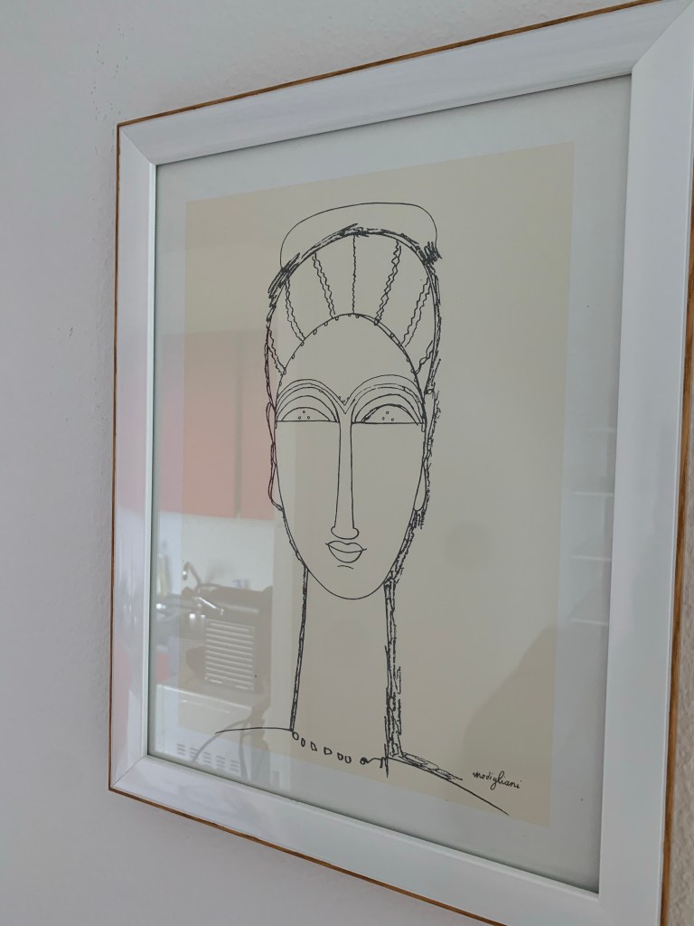 A scary-looking drawing of a person with a neck that is too long.